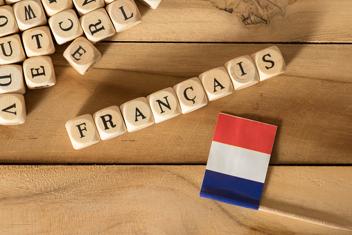 Flagge von Frankreich und das Wort Französisch photo