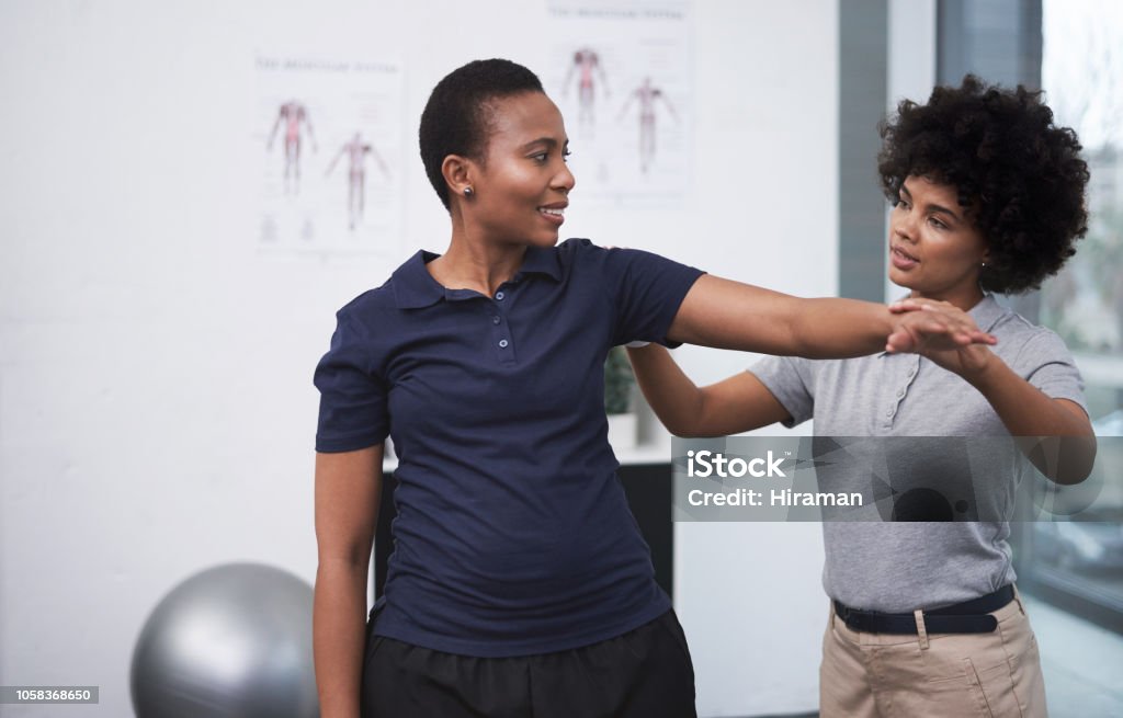 Pt Check Up Performing A Thorough Checkup On Her Patient Stock Photo - Download ...