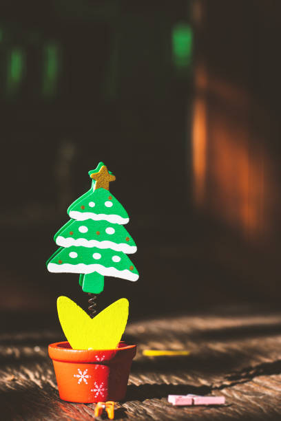 Vintage' christmas tree on wooden floor.