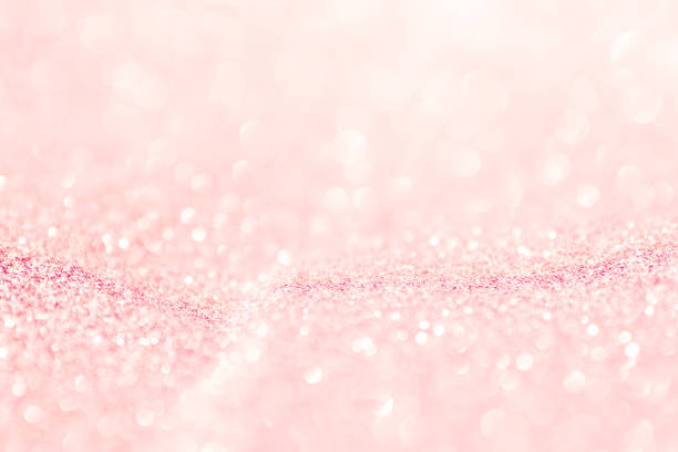 istock abstract background pink light bokeh christmas holiday 1058369354