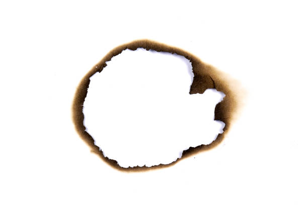 istock paper burned old grunge abstract background texture 1058371140