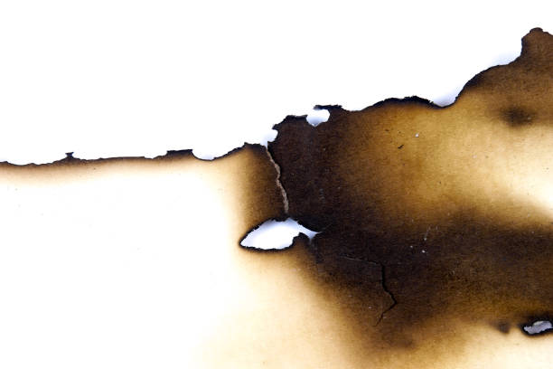 istock paper burned old grunge abstract background texture 1058371248
