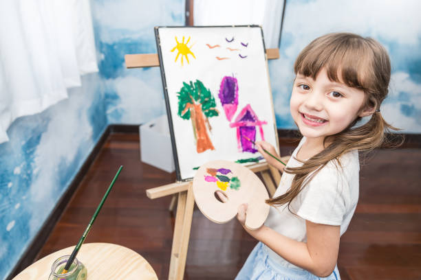 istock Young creative gifted artist home school education learning doing activities back to school concept 1058371722