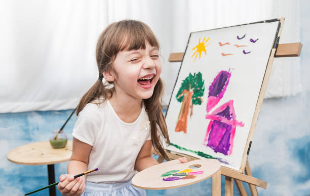 istock Young creative gifted artist home school education learning doing activities back to school concept 1058371728