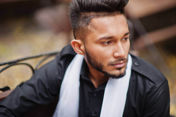 istock Indian stylish man in black traditional clothes 1058373002