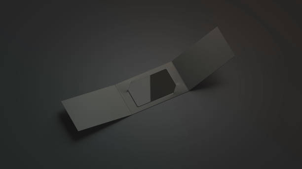 Blank black plastic card mockup inside opened paper booklet holder
