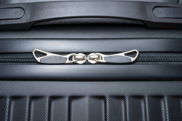 istock Black Luggage Zipper Closeup from top 1058375218