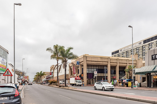 BELLVILLE, SOUTH AFRICA, AUGUST 13, A street scene, with businesses, vehicles and people, in Bellville in the Western Cape Province