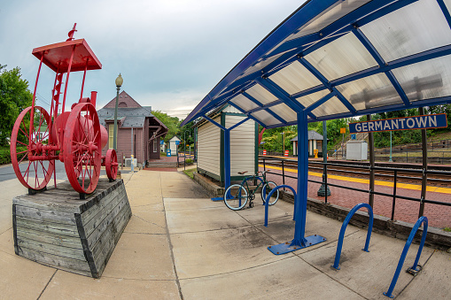 Germantown: Old functional railway station with HOMAGE TO AN ERA by  Mike Shaffer exposed. Germantown is an urbanized census-designated place in Montgomery County, Maryland.