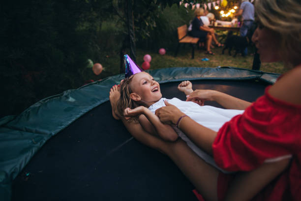 istock Birthday party on a trampoline 1058378974