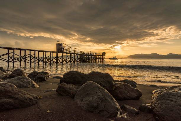 istock sunrise at pier love banyuwangi 1058380732