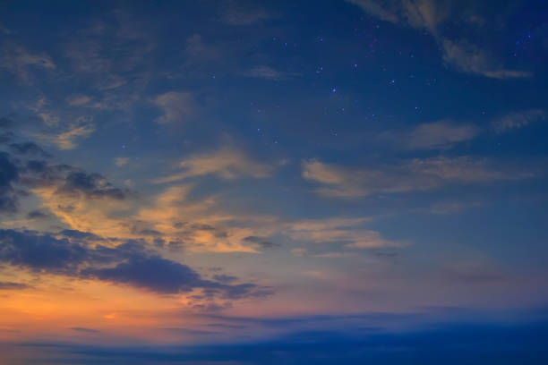 beautiful sunset sky with the stars and clouds. Natural background