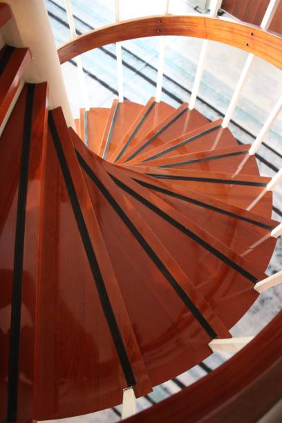 istock Wooden spiral staircase 1058385986