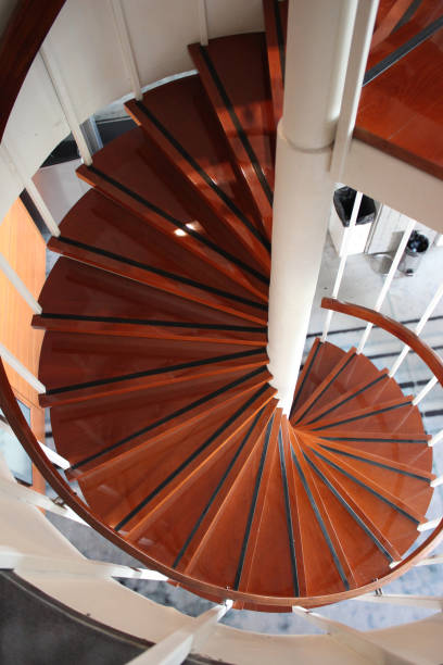 istock Wooden spiral staircase 1058386018