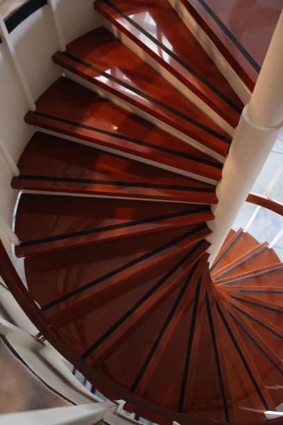 istock Wooden spiral staircase 1058386080
