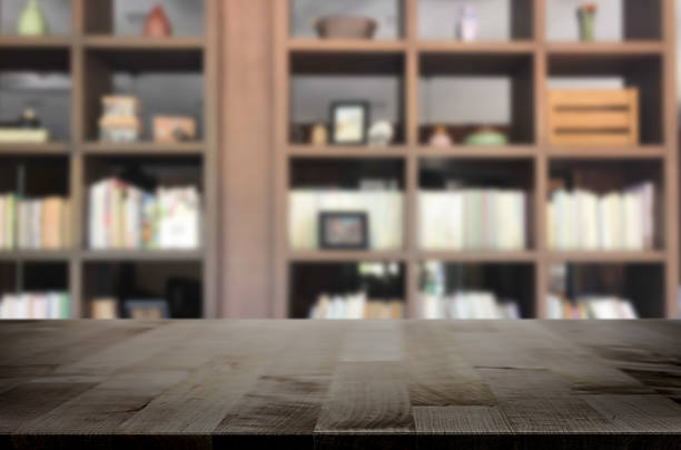 istock Close-Up Of Empty Table Against Shelves At Home 1058390114