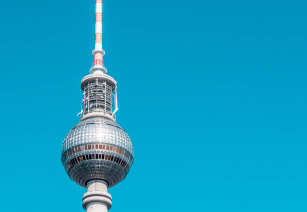 istock Low Angle View Of Fernsehturm Tower Against Blue Sky 1058390540