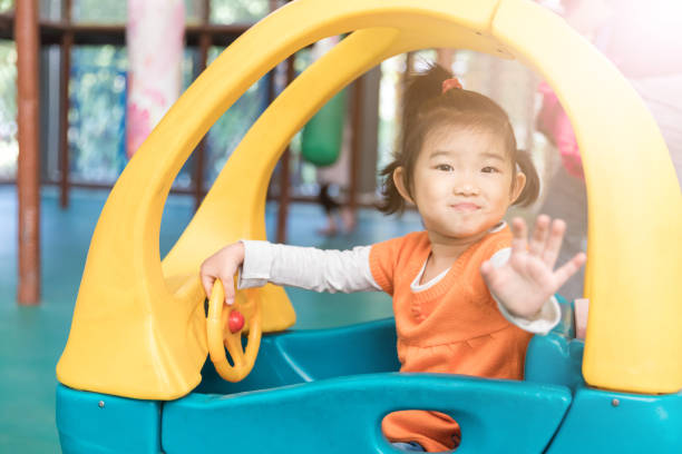 istock Greeting girl 1058392586