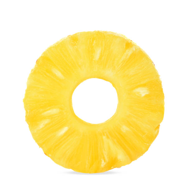 istock Slices of fresh pineapple on white background 1058399046