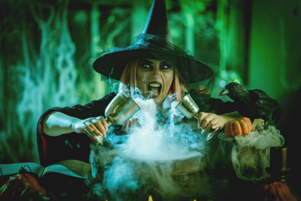 istock Pouring Magical Drink To The Cauldron 1058406876