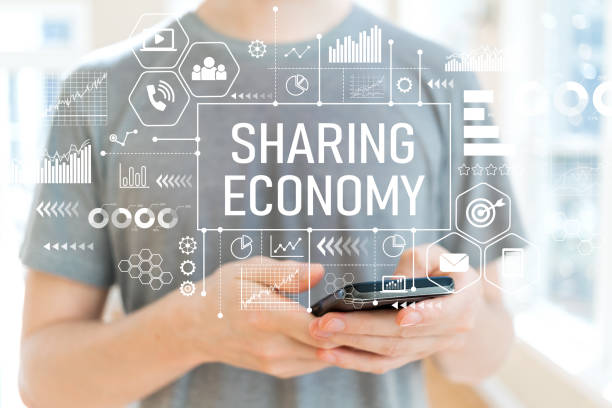 istock Sharing economy with man using a smartphone 1058408326