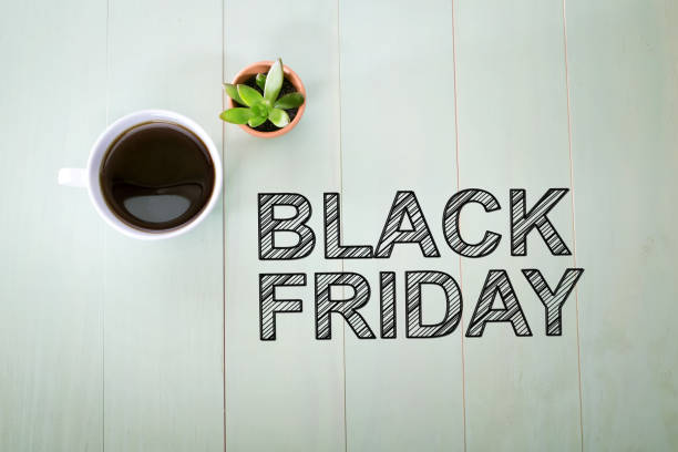 istock Black Friday text with a cup of coffee 1058409174