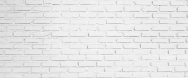 istock light white color brick cement background texture for mock up work and advertise design and decorate 1058409378