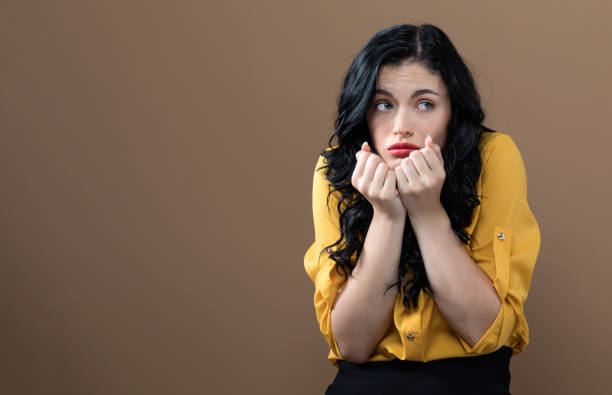 istock Worried young woman 1058409798