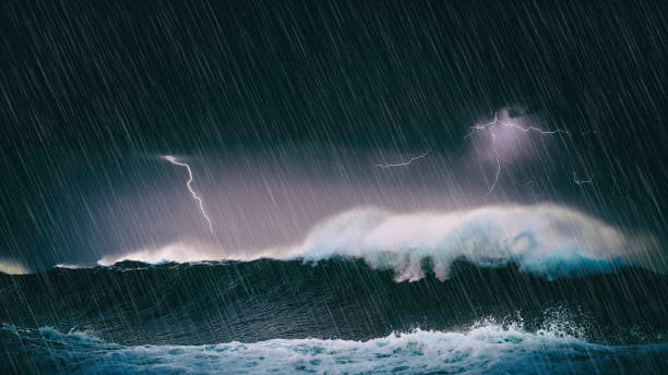 istock thunderstorm in the sea with big waves and lightning 1058410098