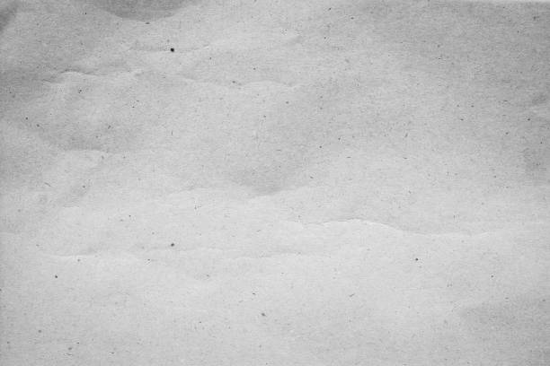 istock crumpled white color paper horizontal background texture for design concept 1058412630