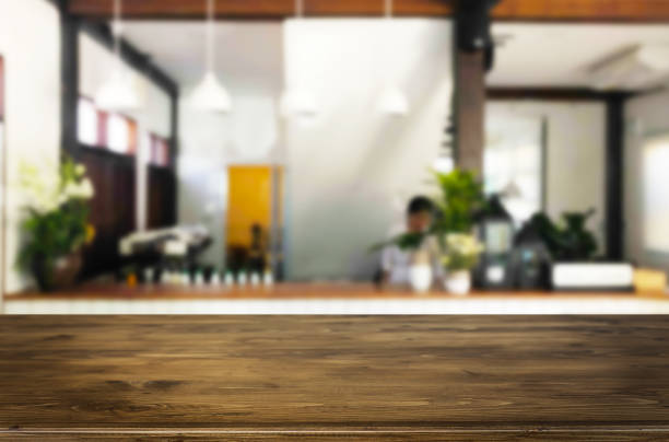 istock Close-Up Of Wooden Table At Restaurant 1058420070