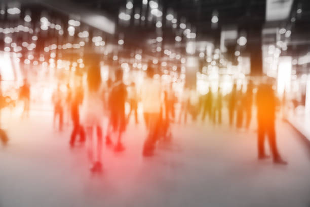 istock Defocused Image Of People In Shopping Mall 1058428084