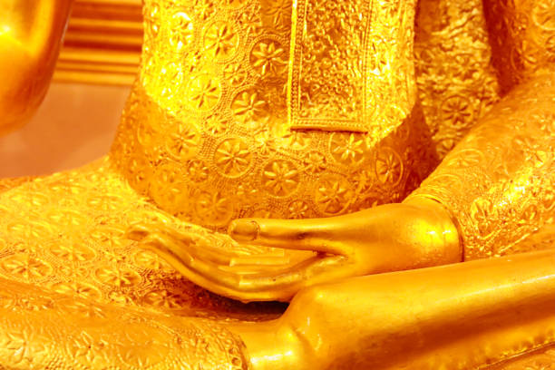 Hand of buddha statue for religious abstract background