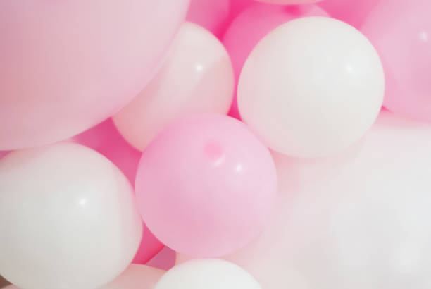 istock white and pink background - balloons 1058435452