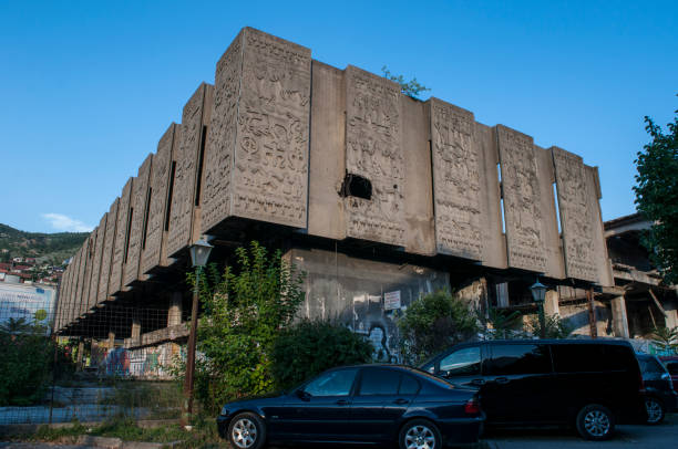 Bosnia: a palace bombed during the Bosnian War (1992-1995) in the streets of Mostar Mostar, Bosnia and Herzegovina, Europe - July 5, 2018: a palace bombed during the Bosnian War (1992-1995) in the streets of Mostar, the old city named after the bridge keepers (mostari) who in the medieval times guarded the Stari Most (Old Bridge) ethnic cleansing stock pictures, royalty-free photos & images