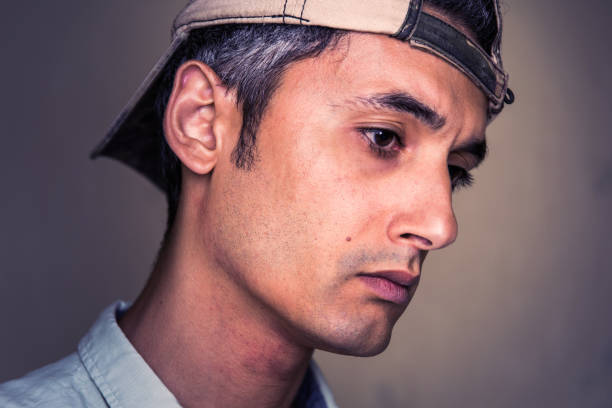 istock Close-Up Of Thoughtful Sad Man 1058439032