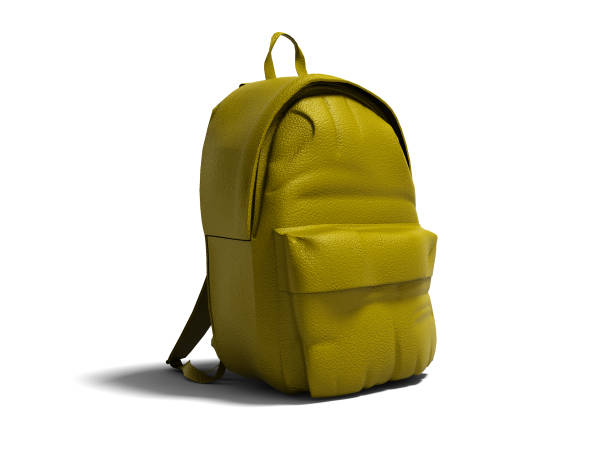 istock Modern yellow leather backpack in school for children and teens left view 3D rendering on white background with shadow 1058446808