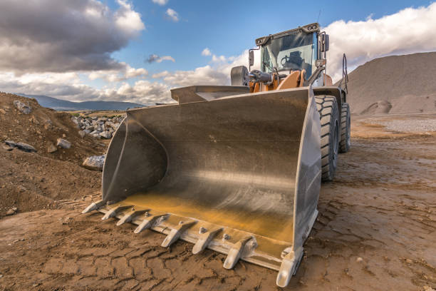 istock Quarry aggregate with heavy duty machinery. Construction industry. 1058453702