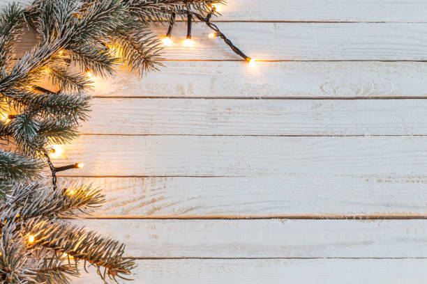 istock Christmas garland on  wooden background 1058454366