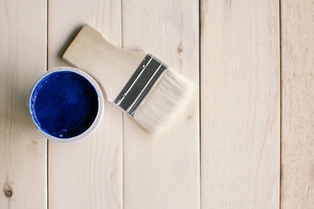 istock Directly Above Shot Of Paint Can With Brush On Table 1058457328