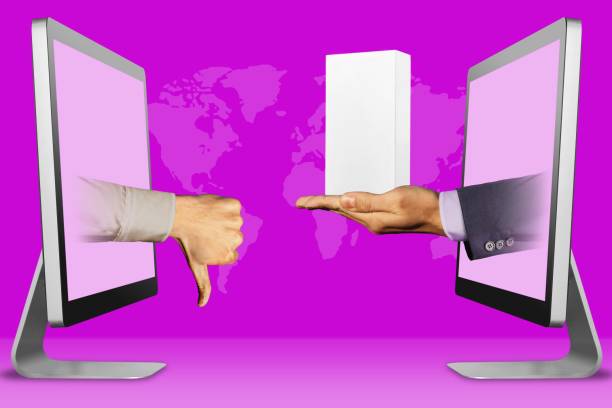 istock ecommerce concept, two hands from monitors. thumbs down, dislike and hand with white small cell phone box. 3d illustration 1058457516