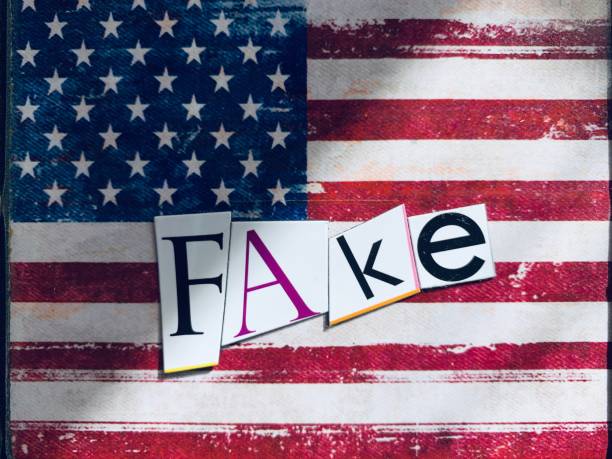istock Word fake lying on the american flag 1058467480