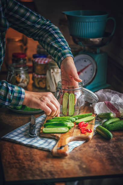 istock Preserving Organic Cucumbers in Jars 1058468474