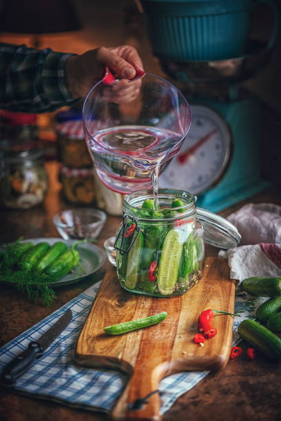 istock Preserving Organic Cucumbers in Jars 1058468498