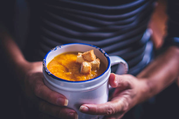 Pumpkin Soup with Croutons Pumpkin Soup with Croutons squash soup stock pictures, royalty-free photos & images