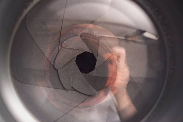 istock camera, silhouette, photographer,lenses 1058472126