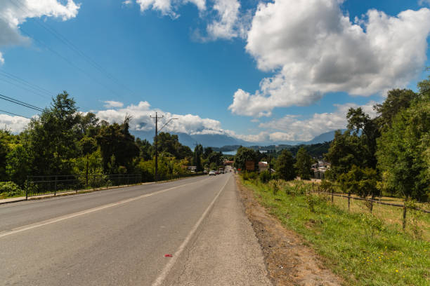 istock Route with a clouded sky and Llanquihue lake on the back 1058479842