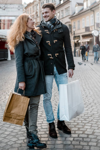 istock Young couple with shopping bags 1058483128