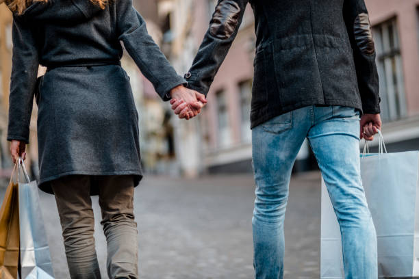 istock Young couple with shopping bags 1058483302