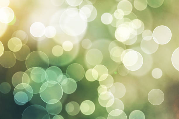 istock Green Bokeh Lights Abstract Background 1058484298